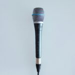 black and gray corded microphone